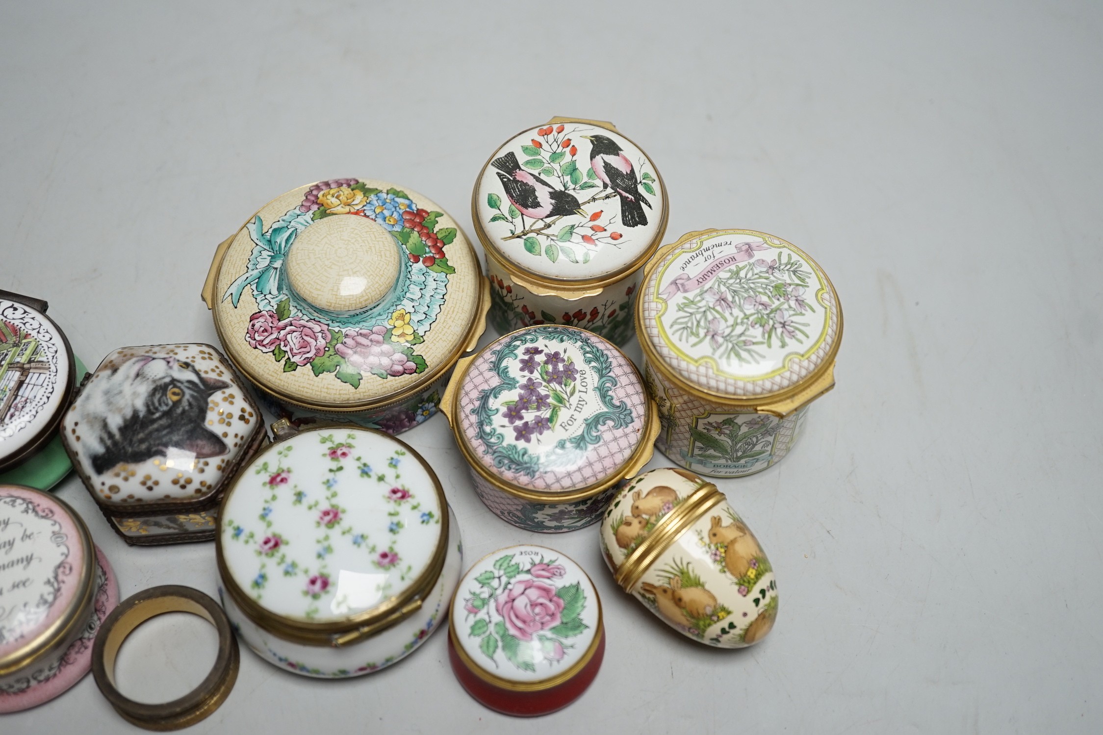 A group of various Halcyon Days and other enamel boxes, approximately twelve items